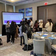 Secondary students gathered in a room for discussion