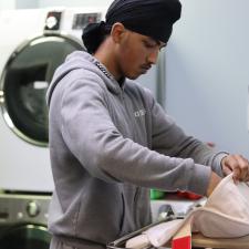 Internship student preparing heating pads for patients